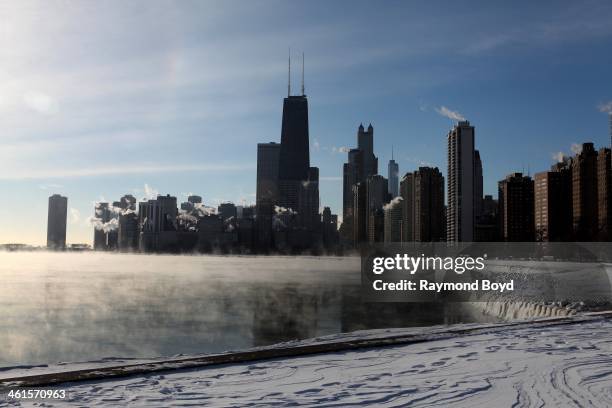 The Chicago Skyline, as photographed from North Avenue Beach as steam rises from Lake Michigan due to the "Polar Vortex" sending temperatures well...