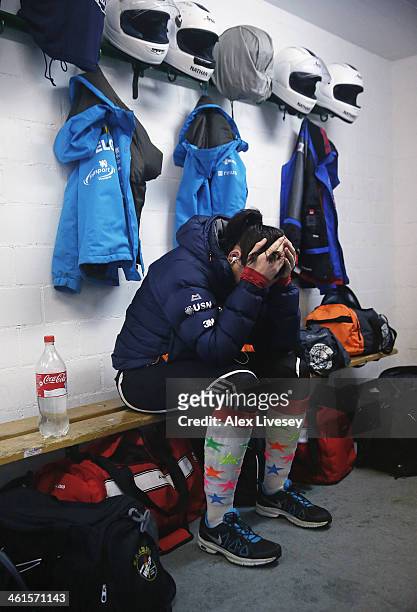 Paula Walker of the Great Britain women's bobsleigh team waits in the athletes changing room as she prepares for a practice session at the Viessmann...