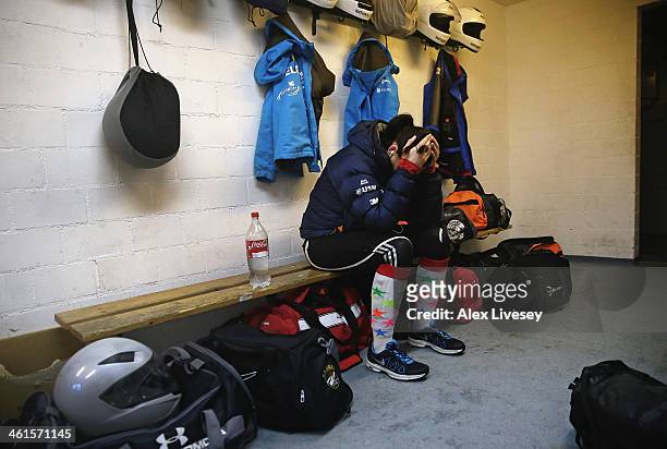 Paula Walker of the Great Britain women's bobsleigh team waits in the athletes changing room as she prepares for a practice session at the Viessmann...