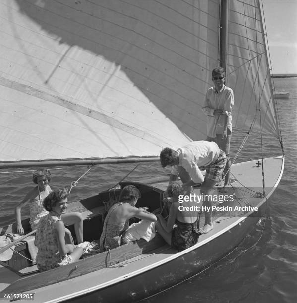 Eunice kennedy, Jacqueline Bouvier, Jean Kennedy, Patricia Kennedy with John F. Kennedy and Edward Kennedy go sailing while on vacation at the...
