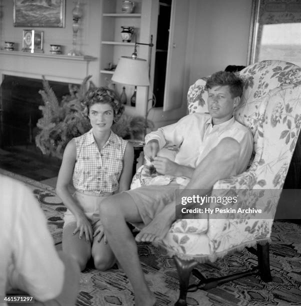 Senator John F. Kennedy and fiance Jacqueline Bouvier are interviewed for a LIFE Magazine story while on vacation at the Kennedy compound in June...