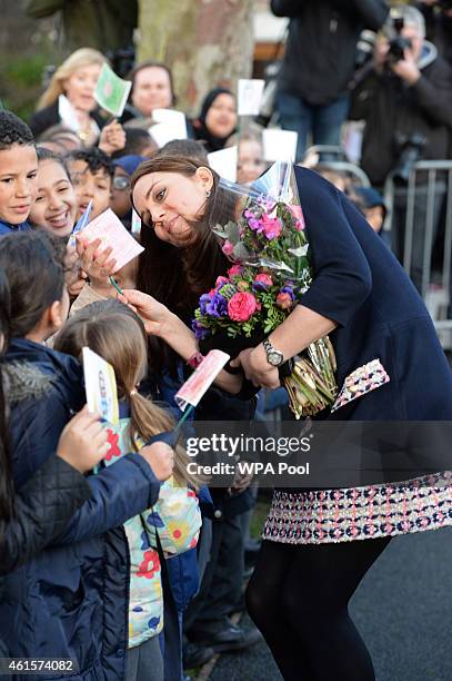 Catherine, Duchess of Cambridge greets school children as she visits Barlby Primary School on January 15, 2015 in London, England. The Duchess of...