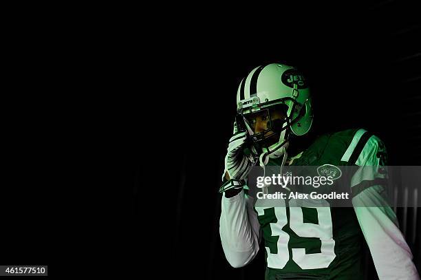 Cornerback Antonio Allen of the New York Jets stands in the tunnel before taking the field against the New England Patriots during a game at MetLife...