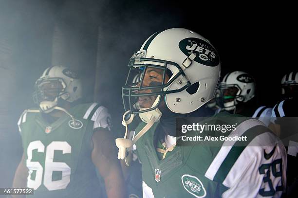Cornerback Antonio Allen of the New York Jets stands in the tunnel before taking the field against the New England Patriots during a game at MetLife...