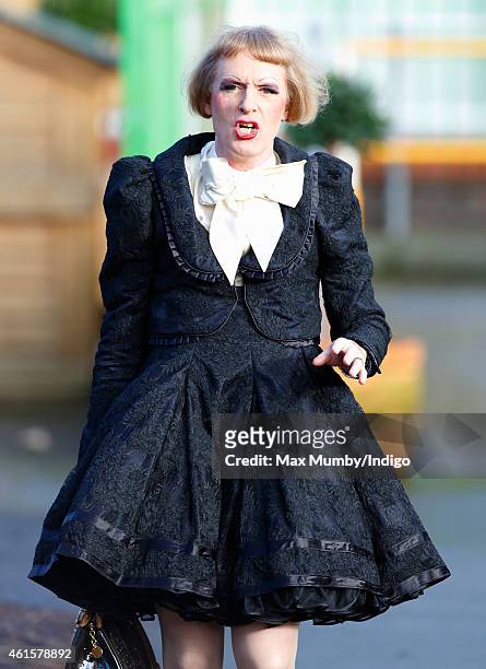 Artist Grayson Perry, dressed as his female alter-ego Claire, awaits the arrival of Catherine, Duchess of Cambridge for a visit to the Clore Art Room...