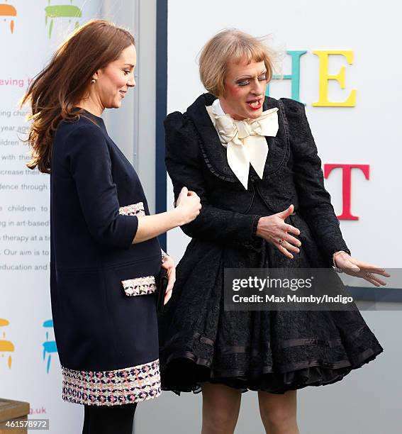 Catherine, Duchess of Cambridge, Royal Patron of The Art Room, talks with artist Grayson Perry, dressed as his female alter-ego Claire, as she...