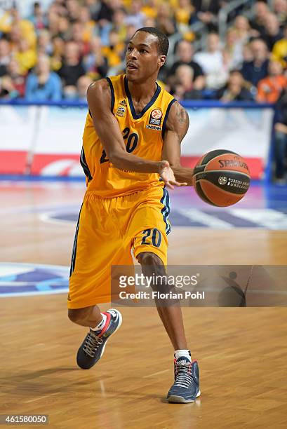Reggie Redding of ALBA Berlin passes the ball during the game between Alba Berlin and Real Madrid on january 15, 2015 in Berlin, Germany.