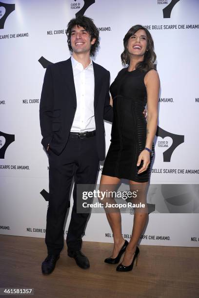 Luca Argentero and Elisabetta Canalis attend La Qualita Si Fa Arte By Cuoio Di Toscana - Pitti Immagine Uomo 85 on January 9, 2014 in Florence, Italy.