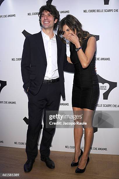 Luca Argentero and Elisabetta Canalis attend La Qualita Si Fa Arte By Cuoio Di Toscana - Pitti Immagine Uomo 85 on January 9, 2014 in Florence, Italy.