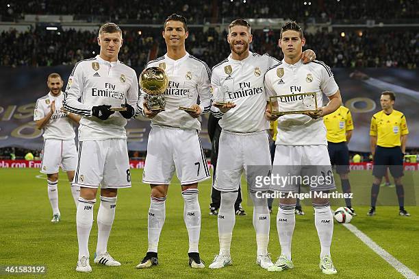 Award winners Toni Kroos, Cristiano Ronaldo, Sergio Ramos and James Rodriguez of Real Madrid pose before the Copa del Rey, round of 16 second leg...
