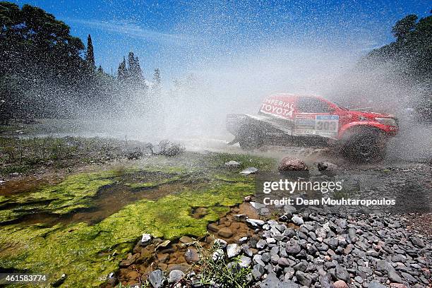 Giniel De Villiers of South Africa and Dirk Von Zitzewitz of Germany for Toyota Imperial Team South Africa in the Pick Up Hilux compete during Stage...