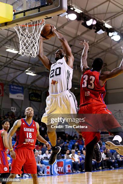 Josh Davis of the Austin Spurs dunks against the Grand Rapids Drive during the NBA D-League Showcase game on January 15, 2015 at Kaiser Permanente...