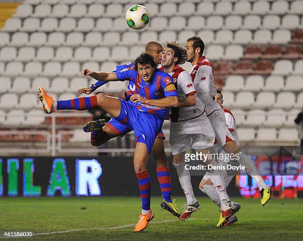 Hector Rodas of Levante UD battles for the ball against Alejandro Galvez of Rayo Vallecano de Madrid during the Copa del Rey Round of 16, 1st Leg...