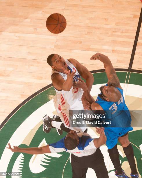 Melvin Ely of the Texas Legends and JR Inman of the Delaware 87ers tip the game off during the 2014 NBA D-League Showcase on January 9, 2014 at the...