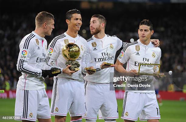 Award winners Toni Kroos, Cristiano Ronaldo, Sergio Ramos and James Rodriguez with trophies ahead of the Copa del Rey Round of 16, Second leg match...