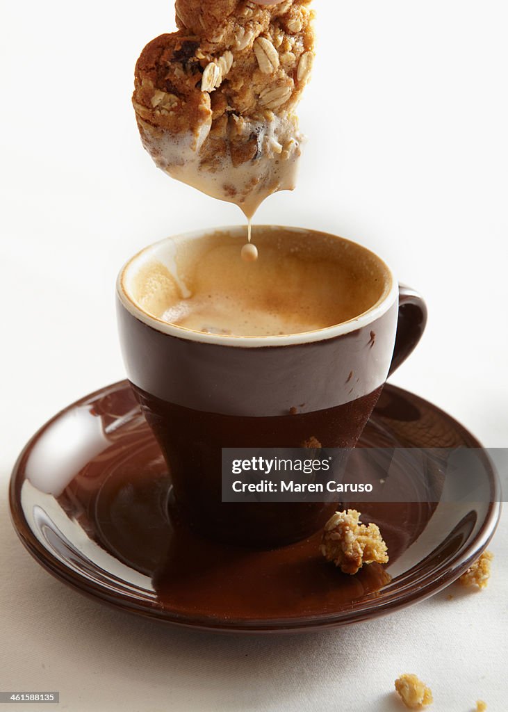 Cookie Being Dunked in Coffee