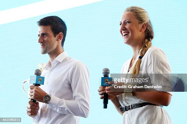 Novak Djokovic of Serbia and Victoria Azarenka of Belarus talk during the 2014 Australian Open official draw at Melbourne Park on January 10, 2014 in...