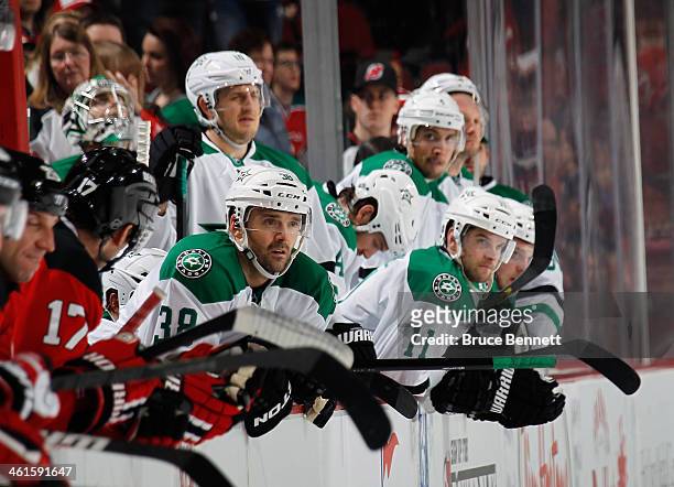 Vernon Fiddler, Dustin Jeffrey and the Dallas Stars watch the closing seconds of their 1-0 loss to the New Jersey Devils at the Prudential Center on...
