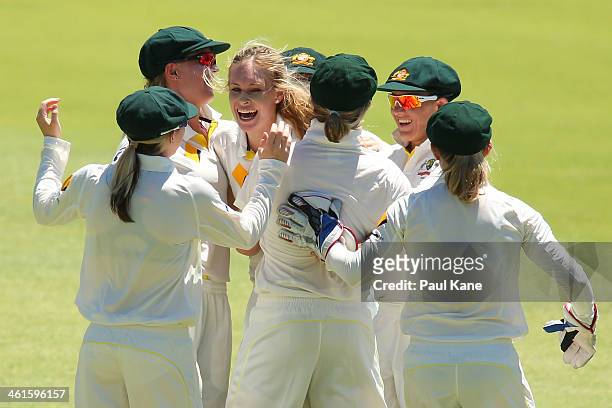 Holly Ferling of Australia celebrates the wicket of Heather Knight of England during day one of the Women's Ashes Test match between Australia and...
