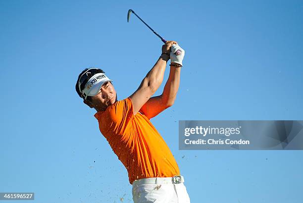 Yang of South Korea tees off on the 17th hole during the first round of the Sony Open in Hawaii at Waialae Country Club on January 9, 2014 in...
