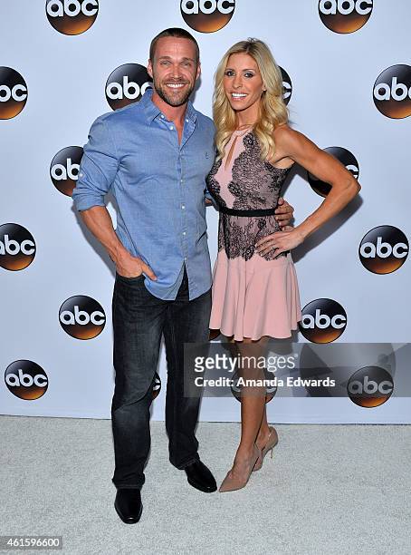 Television personalities Chris Powell and Heidi Powell arrive at the ABC TCA "Winter Press Tour 2015" Red Carpet on January 14, 2015 in Pasadena,...