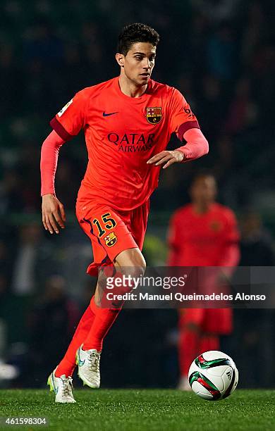 Bartra of Barcelona runs with the ball during the Copa del Rey Round of 16 Second Leg match between Elche FC and FC Barcelona at Estadio Manuel...