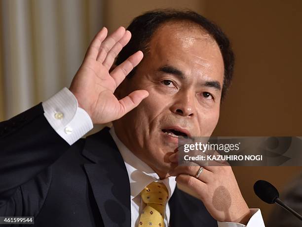 Shuji Nakamura, one of the three Japanese-born winners of the Nobel Prize in Physics 2014, speaks during a press conference at the Foreign...