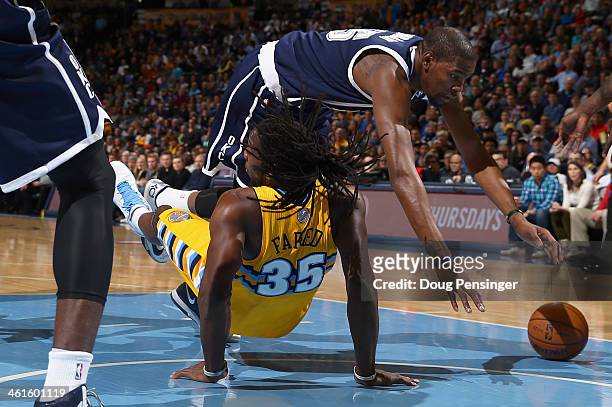 Kevin Durant of the Oklahoma City Thunder goes the court after being fouled by Kenneth Faried of the Denver Nuggets at Pepsi Center on January 9,...