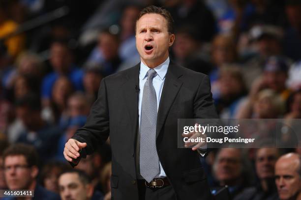 Head coach Scott Brooks of the Oklahoma City Thunder leads his team against the Denver Nuggets at Pepsi Center on January 9, 2014 in Denver,...