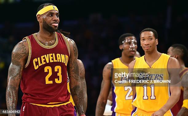 LeBron James of the Cleveland Cavaliers reacts as he takes to the court after a timeout in the second quarter against the Los Angeles Lakers during...