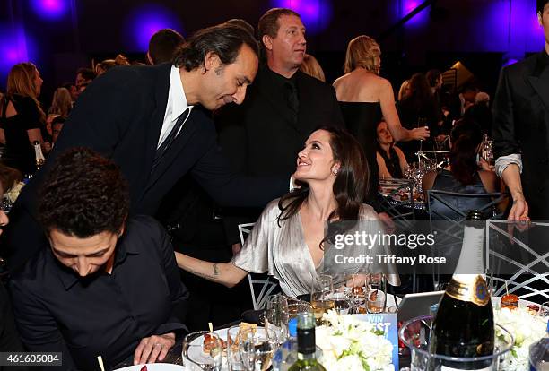 Composer Alexandre Desplat and actress Angelina Jolie attend the 20th annual Critics' Choice Movie Awards at the Hollywood Palladium on January 15,...