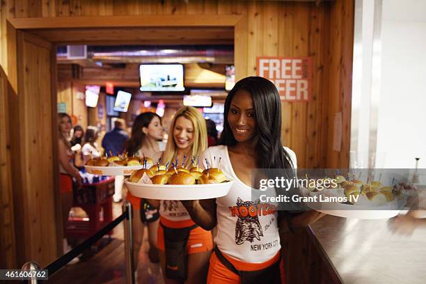 Hooters girls attend Hooters Manhattan VIP Press Party at Hooters Manhattan on January 15, 2015 in New York City.