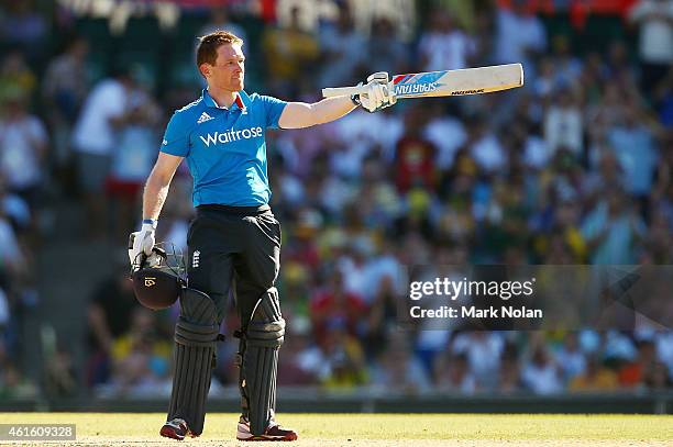 Eoin Morgan of England celebrates scoring a century during the One Day International series match between Australia and England at Sydney Cricket...