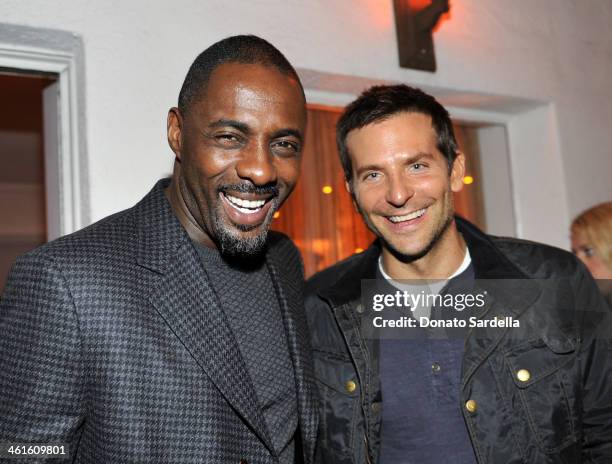 Actor Idris Elba and actor Bradley Cooper attend the W Magazine celebration of The "Best Performances" Portfolio and The Golden Globes with Cadillac...