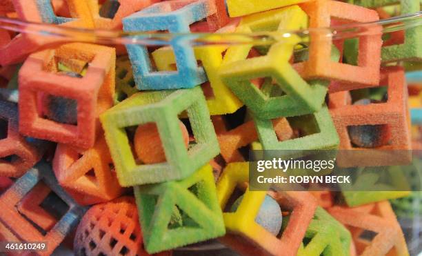 Candies made in a 3D Systems ChefJet Pro 3D food printer are displayed at the 2014 International CES, January 9, 2014 in Las Vegas, Nevada. The...