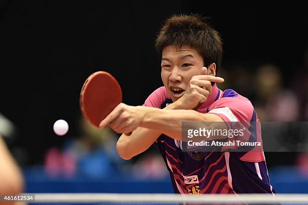 Jun Mizutani of Japan competes in the Men's Singles during day five of All Japan Table Tennis Championships 2015 at Tokyo Metropolitan Gymnasium on...