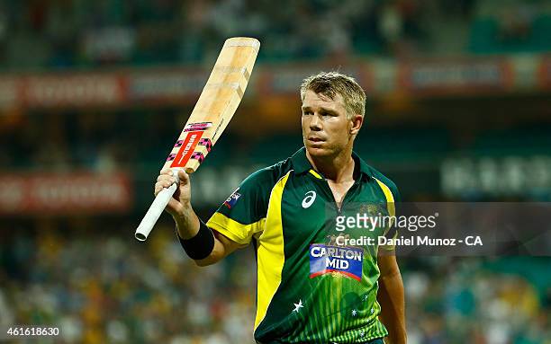David Warner of Australia leaves the pitch after losing his wicket for 127 runs during the One Day International series match between Australia and...