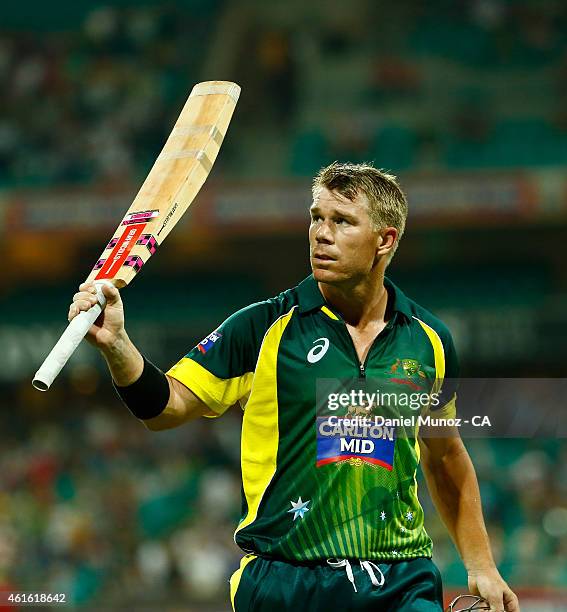 David Warner of Australia leaves the pitch after losing his wicket for 127 runs during the One Day International series match between Australia and...