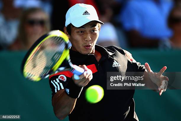 Yen-Hsun Lu of Chinese Tapei plays a forehand during his semi final match against David Ferrer of Spain during day five of the Heineken Open at the...