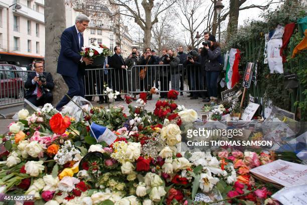 Secretary of State John Kerry pays tribute to the police officer killed in the attack of the satirical newspaper Charlie Hebdo, on January 16, 2015...