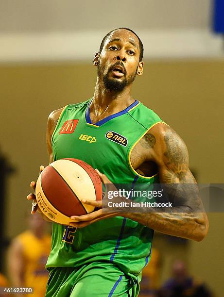 Mickell Gladness of the Crocodiles looks to pass the ball during the round 15 NBL match between the Townsville Crocodiles and Sydney Kings at...