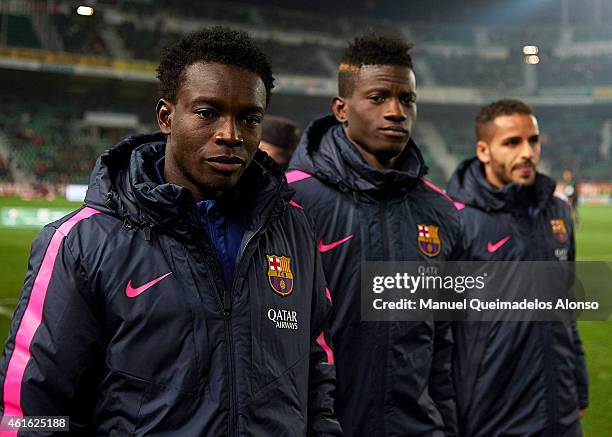 Diawandou Diagne Niang and Edgard Miguel Le of Barcelona watch from the subsitute bench prior to the Copa del Rey Round of 16 Second Leg match...