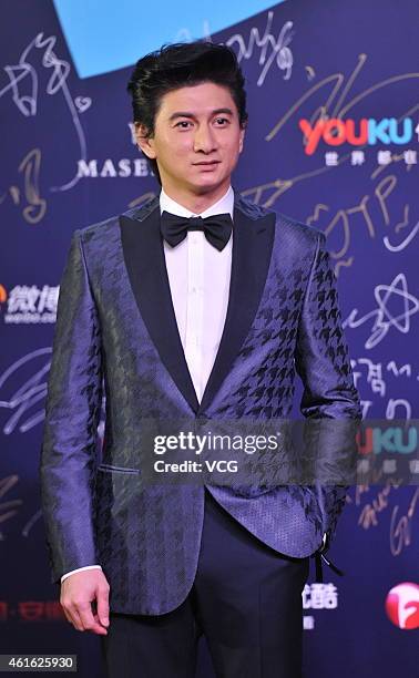 Singer and actor Nicky Wu attends the "2014 Youku Night" at National Aquatics Center on January 16, 2015 in Beijing, China.