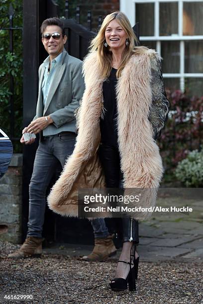Kate Moss seen on her 41st birthday home with Jamie Hince on January 16, 2015 in London, England.