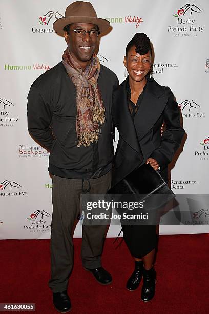 Isaiah Washington and guest arrive at the 5th Annual Los Angeles Unbridled Eve Derby Prelude Party at The London West Hollywood on January 9, 2014 in...