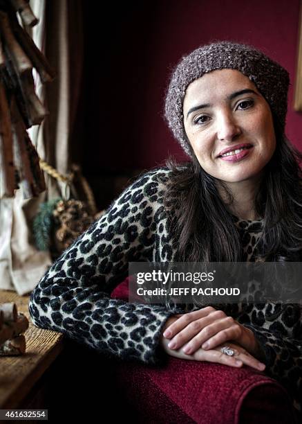 French actress Isabelle Vitari poses on January 16, 2015 during the 18th Comedy film festival in L'Alpe d'Huez. AFP PHOTO / JEFF PACHOUD