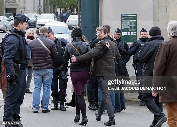 French cartoonist Renald Luzier, aka Luz , arrives at Pere Lachaise cemetery in Paris on January 16, 2015 for the funeral ceremony of Mustapha...