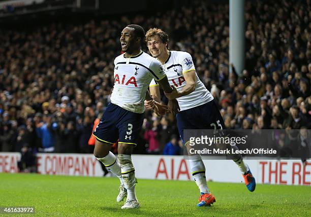Danny Rose of Tottenham Hotspur celebrates scoring a goal to make it 4-2 with Benjamin Stambouli during the FA Cup Third Round Replay match between...