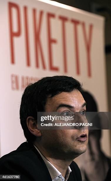French economist Thomas Piketty speaks during a press conference in Buenos Aires on January 16, 2015. Piketty, author of the book "Capital in the...