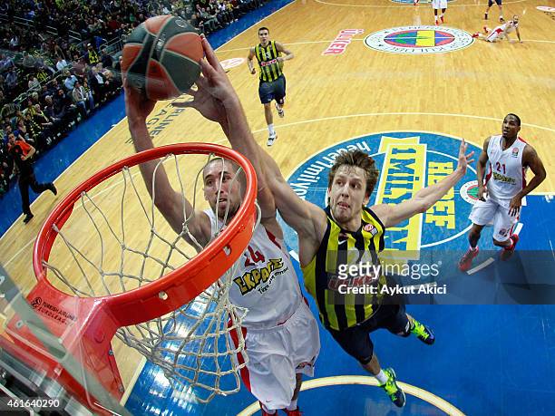 Matthew Lojeski, #24 of Olympiacos Piraeus competes with Jan Vesely, #24 of Fenerbahce Ulker Istanbul during the Euroleague Basketball Top 16 Date 3...